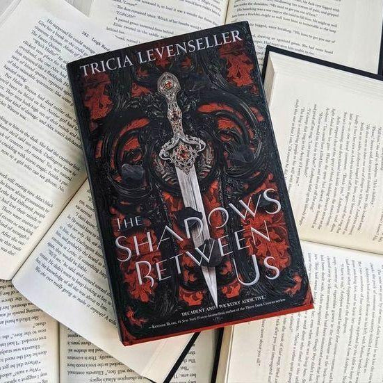 THE SHADOWS BETWEEN US - Tricia Levenseller