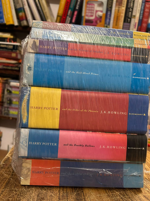 A stack of five Harry Potter  UK books by J.K.