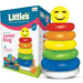 Colorful stacking toy with smiling face next to its packaging